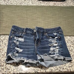American Eagle Outfitters Ripped Blue Jean Hi Rise Shortie Shorts